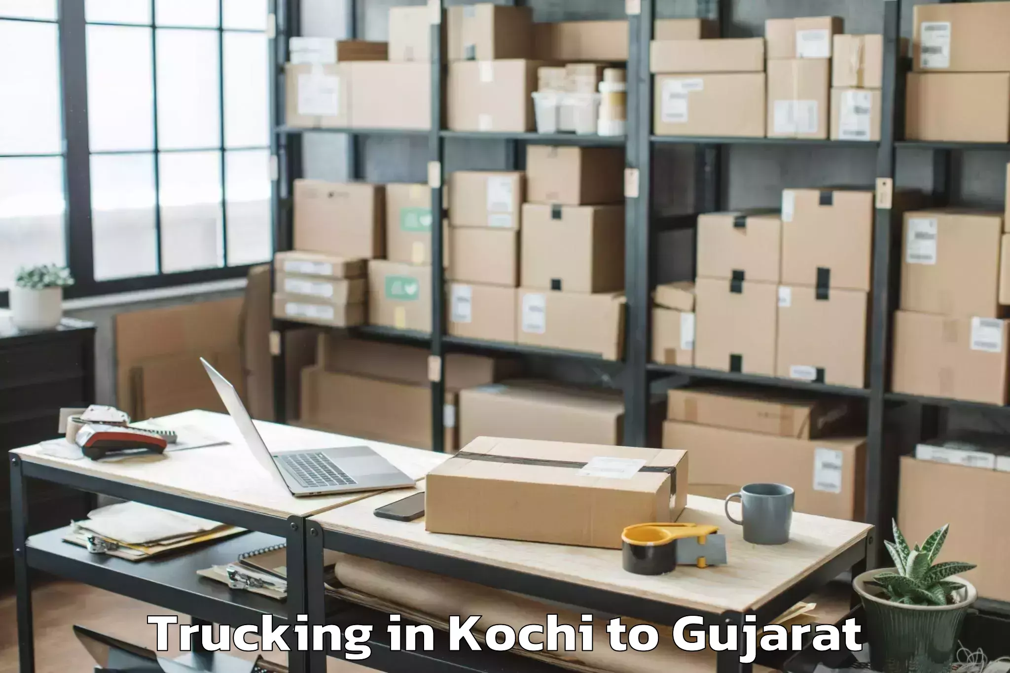 Hassle-Free Kochi to Damnagar Trucking